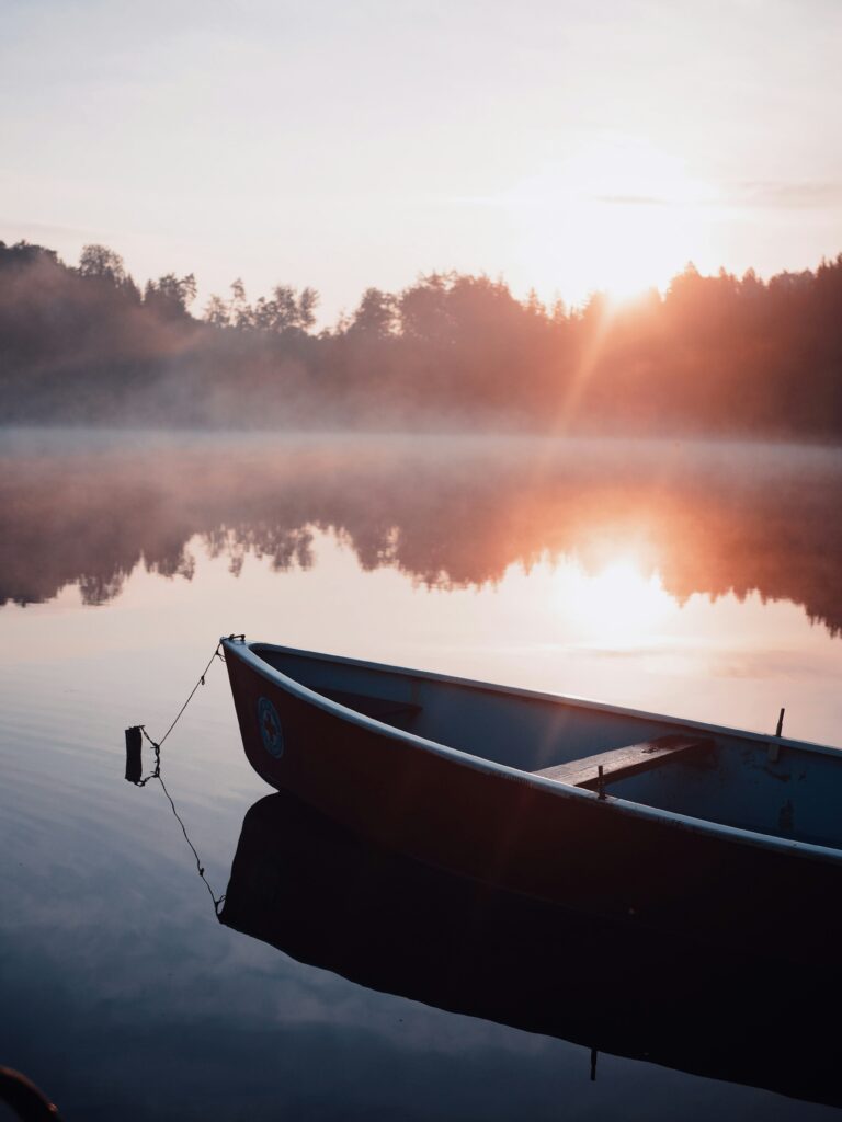 This image of a small boat, floating on a still lake at sunrise, evoked the sense of peace I feel when having acupuncture treatemnts